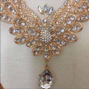 Huge ornate gold and rhinestone peacock necklace